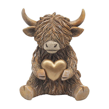 Highland Cow with gold heart