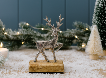Deer on wooden base 15cm