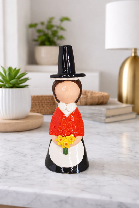 Welsh lady with hat & daffodil bunch