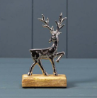 Deer on wooden base 15cm